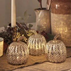 3 Citrouilles Lumineuses Mouchetées Cuivre En Verre 13 3 Citrouilles Lumineuses Mouchetées Cuivre En Verre -Noel Deco Magasin LL21058 3 citrouilles lumineuses mouchetees cuivre en verre