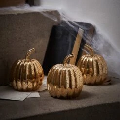 3 Citrouilles Lumineuses Mouchetées Cuivre En Verre 21 3 Citrouilles Lumineuses Mouchetées Cuivre En Verre -Noel Deco Magasin LL21058 3 citrouilles lumineuses mouchetees cuivre en verre 1 d58a2006 9c7f 4c7c a319 e888fca1f023