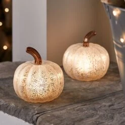 Citrouille Lumineuse En Verre à La Patine Blanche 22 Citrouille Lumineuse En Verre à La Patine Blanche -Noel Deco Magasin LL21059 Duo de citrouille lumineuse en verre a la patine blanche