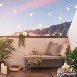 Guirlande Guinguette Pro Connect IP67 De 10m 20 LED Blanc Chaud Câble Blanc Raccordable Ampoules Transparentes 8 Guirlande Guinguette Pro Connect IP67 De 10m 20 LED Blanc Chaud Câble Blanc Raccordable Ampoules Transparentes -Noel Deco Magasin PR10 2YWWC Guirlande guinguette pro connect blanc chaud cable blanc sur balcon avec fontaine et bougies coucher de soleil 2 1