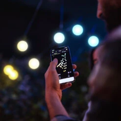 Guinguette Guinguette Twinkly De 10m Avec 20 LED Contrôlables Par Smartphone Édition Gold & Silver 6 Guinguette Guinguette Twinkly De 10m Avec 20 LED Contrôlables Par Smartphone Édition Gold & Silver -Noel Deco Magasin TW22001 guirlande guinguette twinkly controlable par smartphone ambre et blanc vue rapproche