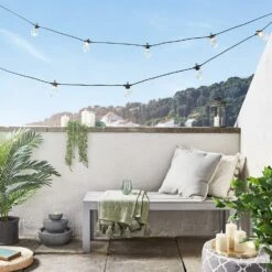 Guirlande Guinguette Core Connect 50 M 100 Ampoules Blanc Chaud Câble Noir Raccordable 8 Guirlande Guinguette Core Connect 50 M 100 Ampoules Blanc Chaud Câble Noir Raccordable -Noel Deco Magasin guirlande guinguette core connect sur balcon avec bougies TruGlow b56f8549 229b 4dab b8d8 b6dc431659de